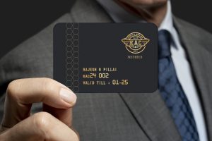 Businessman showing a credit card
